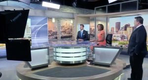 Fox 9 News anchors in studio