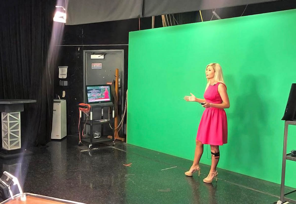 Rachel Vadaj on green screen of Cleveland 19 News live stream
